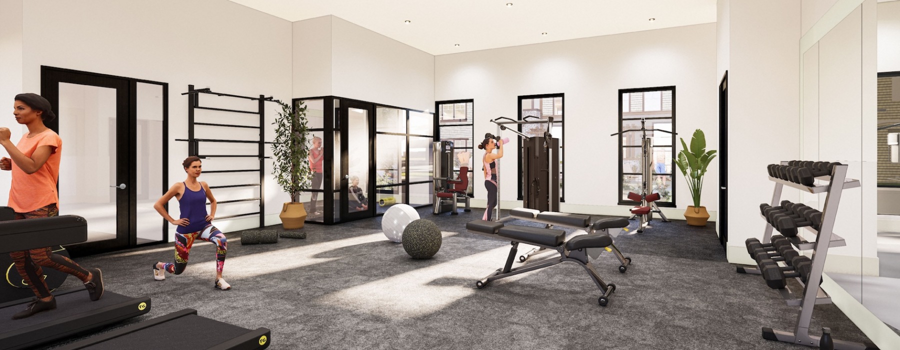 The fitness center at our apartments for rent in Menifee, CA, featuring free weights, treadmills, and people working out.